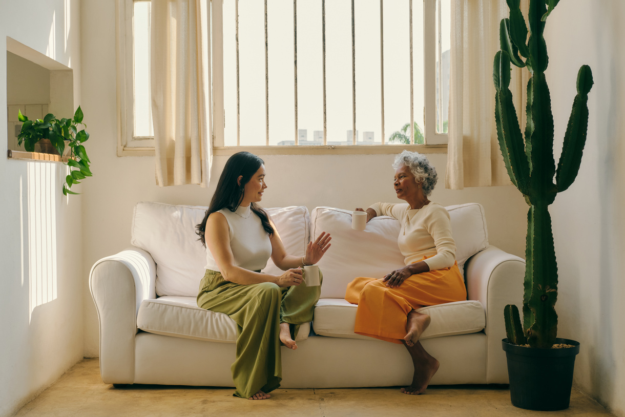 Mindfulness Practices Women Chatting on a Couch